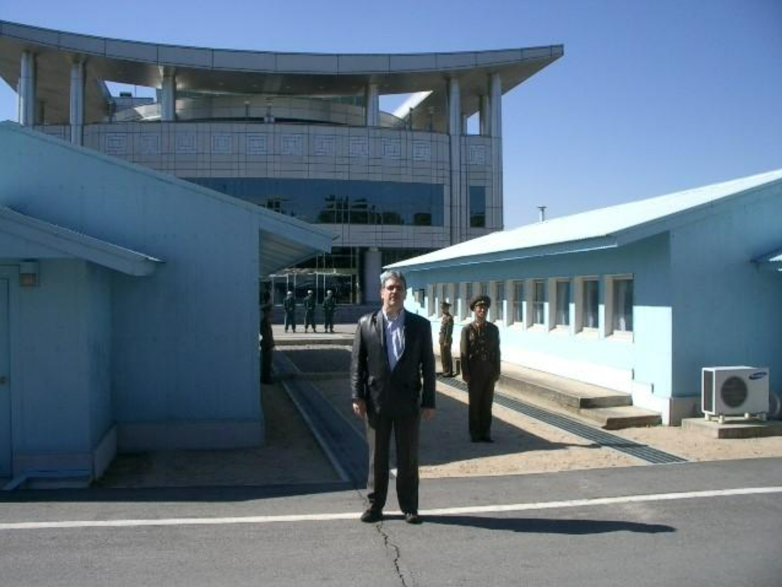 Felix Abt stands on the 38th parallel separating North and South Korea
